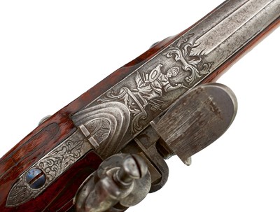 Lot AN ORNATE PAIR OF 26-BORE FLINTLOCK BOHEMIAN HOLSTER OR DUELLING PISTOLS