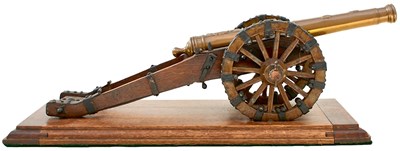Lot A LATE 19TH OR EARLY 20TH CENTURY BRONZE MODEL FIELD CANNON