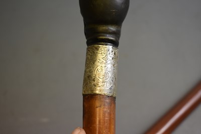 Lot 930 - A MEMENTO MORI SWORD STICK