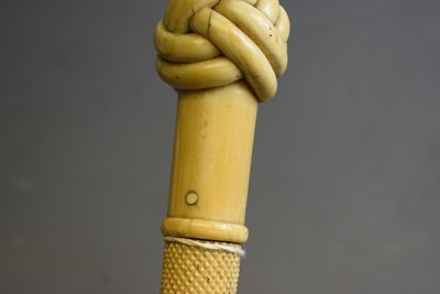 Lot 925 - A 19TH CENTURY CARVED WHALE BONE WALKING STICK