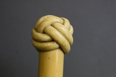 Lot 925 - A 19TH CENTURY CARVED WHALE BONE WALKING STICK