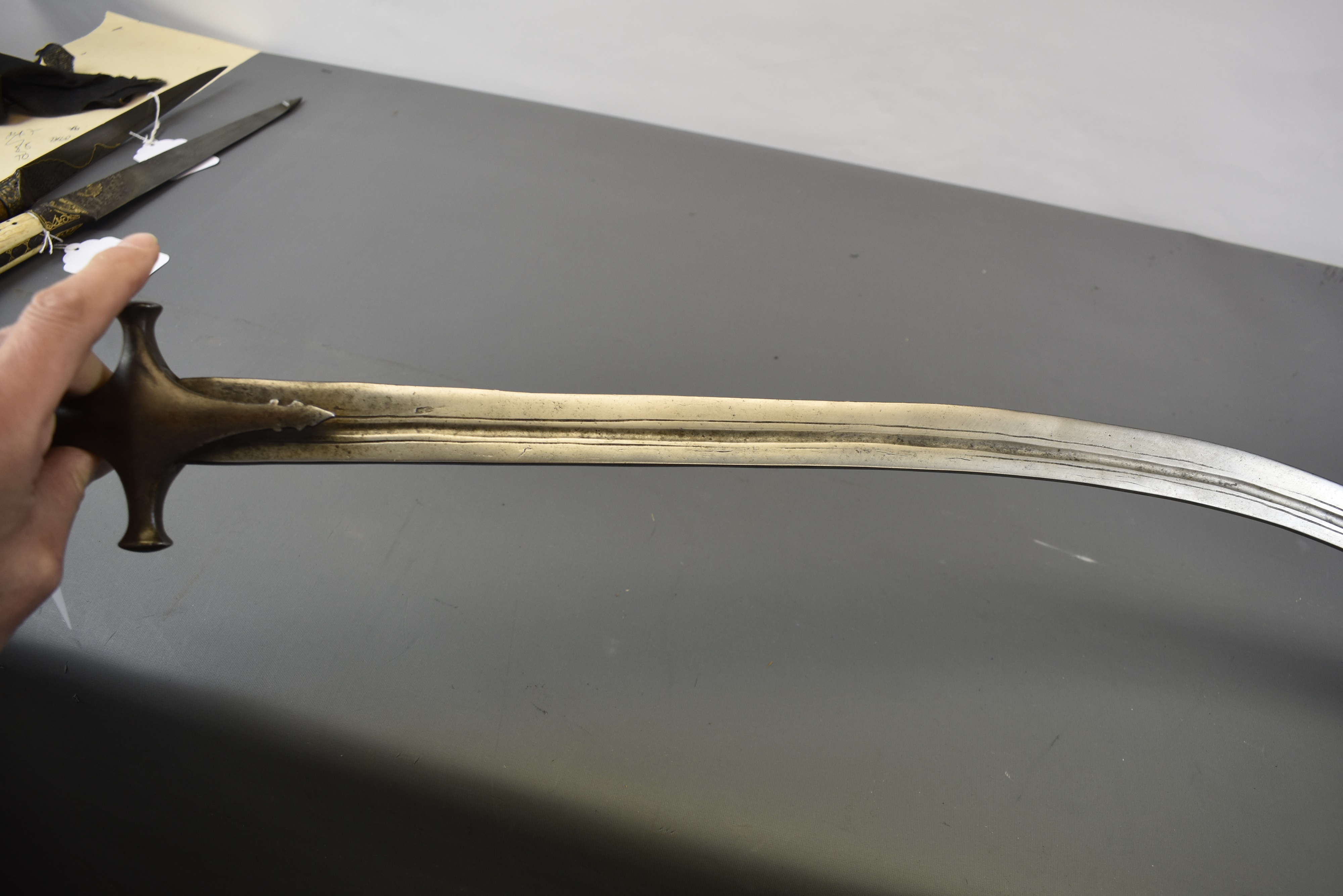 Lot 41 - A 19TH CENTURY INDIAN TULWAR OR SWORD,