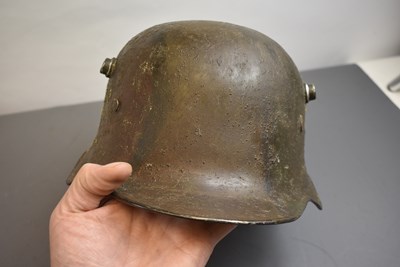 Lot 747 - AN IMPERIAL GERMAN MODEL 1918 CUT-OUT HELMET