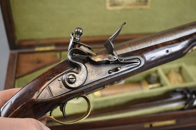 Lot 229 - A CASED PAIR OF 10-BORE FLINTLOCK LONG BARRELLED DUELLING OR OFFICER'S PISTOLS BY PARKER OF LONDON