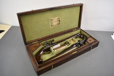 Lot 229 - A CASED PAIR OF 10-BORE FLINTLOCK LONG BARRELLED DUELLING OR OFFICER'S PISTOLS BY PARKER OF LONDON