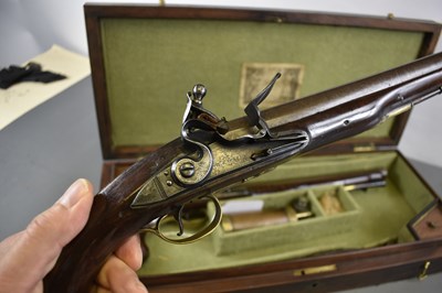 Lot 229 - A CASED PAIR OF 10-BORE FLINTLOCK LONG BARRELLED DUELLING OR OFFICER'S PISTOLS BY PARKER OF LONDON