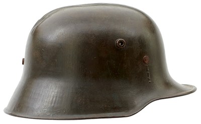 Lot 748 - AN IMPERIAL GERMAN MODEL 1916 MACHINE GUNNER'S STEEL HELMET